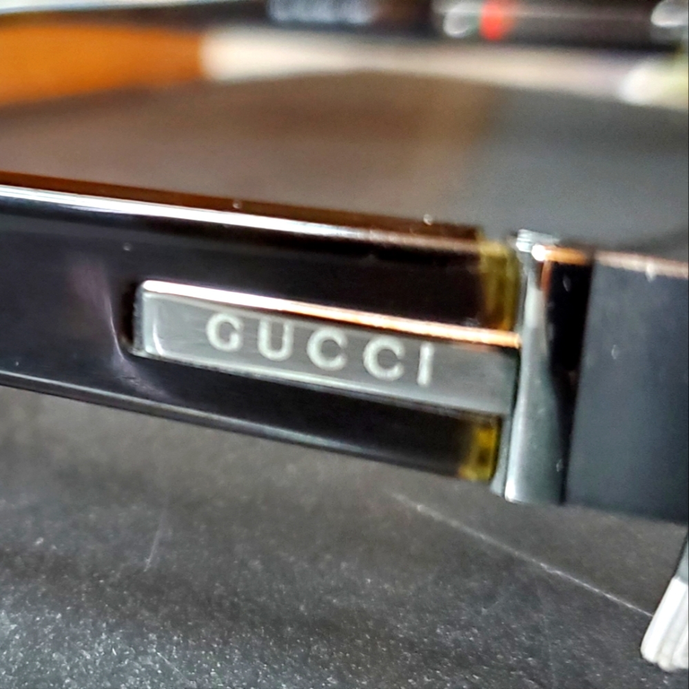 Brown Gucci rimless Eyewear